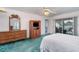 Inviting main bedroom with sliding glass doors to the pool area at 22434 Walton Ave, Port Charlotte, FL 33952