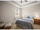 Calm bedroom with comfy queen bed, carpeted floors, and side tables with lamps at 226 Tapa Parish Run, Bradenton, FL 34212