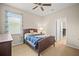 Cozy bedroom with natural light, ceiling fan and adjacent office at 226 Tapa Parish Run, Bradenton, FL 34212