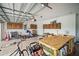 Spacious two-car garage with ample storage space and epoxy flooring at 226 Tapa Parish Run, Bradenton, FL 34212