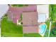 Overhead view of home showcasing the outdoor pool and patio area at 2315 Riverwood Pines Dr, Sarasota, FL 34231