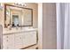 Bathroom with vanity, a large mirror, toilet and shower with curtain at 2315 Riverwood Pines Dr, Sarasota, FL 34231