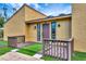 Charming home featuring unique landscaping, a front porch, and a cozy entrance at 2315 Riverwood Pines Dr, Sarasota, FL 34231