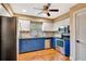 Spacious kitchen features stainless steel appliances, granite countertops, and ample cabinet space at 2315 Riverwood Pines Dr, Sarasota, FL 34231
