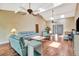 Spacious living room featuring high ceilings, hardwood floors and comfortable couches at 2315 Riverwood Pines Dr, Sarasota, FL 34231
