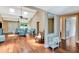 Open living room with vaulted ceilings, wood flooring and natural light from the window at 2315 Riverwood Pines Dr, Sarasota, FL 34231