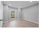 Bedroom featuring a window with a view, recessed lighting, and wood-look vinyl floors at 2405 Mistleto Ln, North Port, FL 34286