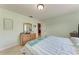 Bedroom featuring tile flooring and traditional wood furniture at 2406 15Th W St, Palmetto, FL 34221