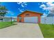 House with lovely lawn, new fence and one-car garage at 2406 15Th W St, Palmetto, FL 34221
