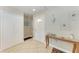 Welcoming foyer with neutral tile flooring, closet, and decorative table at 2406 15Th W St, Palmetto, FL 34221
