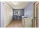 Functional laundry room with ample storage space and natural light at 2850 Bon Air Ave, Sarasota, FL 34234