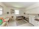 Unfinished basement area with work benches, shelving and ample storage at 3217 Oak Grove Dr, Sarasota, FL 34243