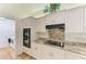 Modern kitchen features stainless appliances, cooktop, granite counters and ample cabinet space at 3217 Oak Grove Dr, Sarasota, FL 34243