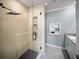 Modern bathroom with a glass-enclosed shower, and stylish fixtures at 3355 Hilltop Cir, Bradenton, FL 34211