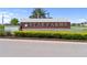 The 'Star Farms at Lakewood Ranch' community sign surrounded by manicured landscaping welcomes residents and visitors at 3355 Hilltop Cir, Bradenton, FL 34211