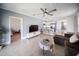 Open-concept living room and kitchen area featuring modern finishes and plenty of natural light at 3355 Hilltop Cir, Bradenton, FL 34211