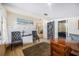 Inviting living room featuring cozy seating, stylish decor, and easy access to other living spaces at 3641 Stokes Dr, Sarasota, FL 34232