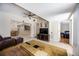 Open concept living area with dining and kitchen access, and cozy furniture at 3641 Stokes Dr, Sarasota, FL 34232