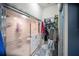 Bathroom featuring a glass-enclosed shower and a walk-in closet for storage at 3957 Proctor Rd, Sarasota, FL 34233