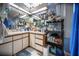 Bathroom with dual vanity, countertop storage and large mirror at 3957 Proctor Rd, Sarasota, FL 34233