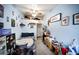 Bedroom boasting single bed, ceiling fan and decoratively painted walls at 3957 Proctor Rd, Sarasota, FL 34233