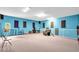 Expansive bonus room, featuring carpet, acoustic panels, and natural light at 4105 37Th E St, Bradenton, FL 34208