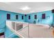Large bonus room with acoustic panels, neutral carpet, and bright lighting at 4105 37Th E St, Bradenton, FL 34208