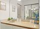 Bathroom with a well-lit vanity, a large mirror, and a clean, functional design at 4411 46Th W Ave # 201, Bradenton, FL 34210