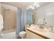 Bright bathroom with a tub and shower combination plus an elegant vanity area at 4411 46Th W Ave # 201, Bradenton, FL 34210