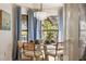 Charming dining area with chandelier, natural light, and seating for four at 4411 46Th W Ave # 201, Bradenton, FL 34210