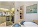Open dining area next to kitchen features sailboat art and transitions seamlessly to the kitchen at 4411 46Th W Ave # 201, Bradenton, FL 34210