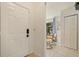 Bright condo entrance with tiled floor leading to eating nook with natural light at 4411 46Th W Ave # 201, Bradenton, FL 34210