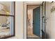 Condo entrance with blue door leading into a bright, tiled hallway with dining visible at 4411 46Th W Ave # 201, Bradenton, FL 34210