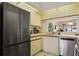 Modern kitchen featuring stainless steel appliances, light cabinets, and ample countertop space for culinary enthusiasts at 4411 46Th W Ave # 201, Bradenton, FL 34210