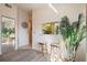 Inviting living area with bar stools, a kitchen view, and stylish decor at 4411 46Th W Ave # 201, Bradenton, FL 34210
