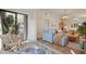 Bright living area with access to the balcony, offering a seamless indoor-outdoor living at 4411 46Th W Ave # 201, Bradenton, FL 34210