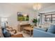Cozy living room with modern decor, stylish TV, and comfortable seating at 4411 46Th W Ave # 201, Bradenton, FL 34210