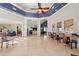 Bright and spacious lobby with high ceilings, archways, tile floors, and seating areas provides a transition at 4411 46Th W Ave # 201, Bradenton, FL 34210