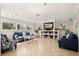Inviting lobby area with comfortable seating, bookshelves, and natural light creates a welcoming atmosphere at 4411 46Th W Ave # 201, Bradenton, FL 34210
