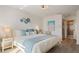 Comfortable bedroom with beachy decor and attached bathroom at 4411 46Th W Ave # 201, Bradenton, FL 34210