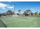 Inviting tennis court featuring well-kept grounds and lighting for extended play at 4411 46Th W Ave # 201, Bradenton, FL 34210