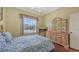 Bedroom with window view, dresser and mirror at 4735 Starboard Dr, Bradenton, FL 34208