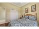 Bedroom featuring a comfortable bed and closet at 4735 Starboard Dr, Bradenton, FL 34208