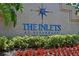 Community sign for “The Inlets at Riverdale” with colorful landscaping at 4735 Starboard Dr, Bradenton, FL 34208