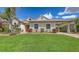 Charming single-story home boasts a well-manicured lawn, decorative shrubbery, and a convenient carport for easy parking at 4735 Starboard Dr, Bradenton, FL 34208