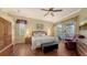 Comfortable main bedroom with ceiling fan, window and sliding glass door at 4735 Starboard Dr, Bradenton, FL 34208