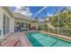 Enclosed swimming pool with patio area, and plenty of seating for Gathering and friends at 4735 Starboard Dr, Bradenton, FL 34208