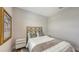 Comfortable bedroom featuring a designer headboard, side tables, and a cozy bed with stylish bedding at 491 Daylily Blvd, Nokomis, FL 34275