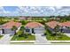 Beautiful single-story home with tile roof, landscaping, and paver driveway in quiet neighborhood at 491 Daylily Blvd, Nokomis, FL 34275