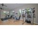 Community gym featuring weight machines, workout benches and lots of natural light at 491 Daylily Blvd, Nokomis, FL 34275